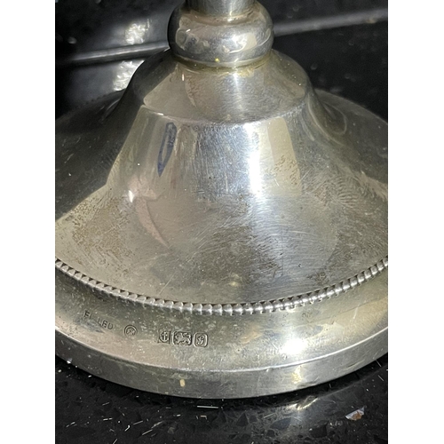 664 - A HALLMARKED BIRMINGHAM SILVER CANDLESTICK WITH WEIGHTED BASE