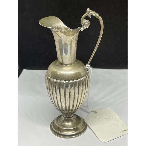 665 - A MARKED SILVER JUG GROSS WEIGHT 75.4 GRAMS