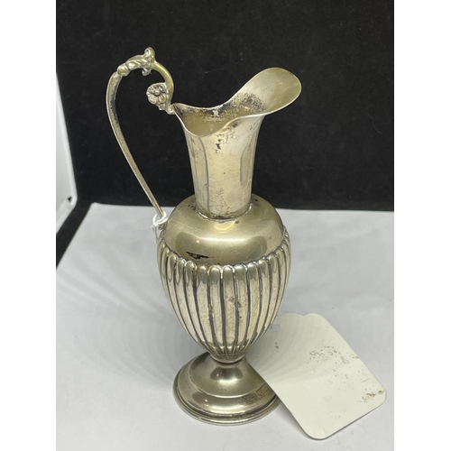 665 - A MARKED SILVER JUG GROSS WEIGHT 75.4 GRAMS