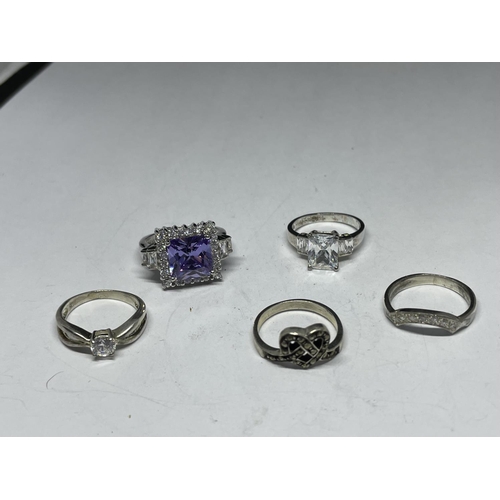 668 - FIVE VARIOUS SILVER RINGS