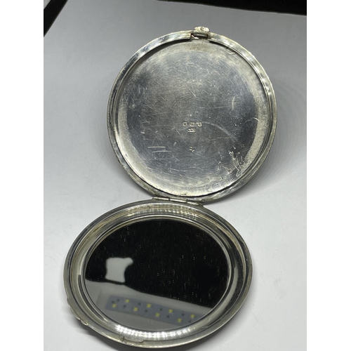 671 - A HALLMARKED BIRMINGHAM SILVER COMPACT