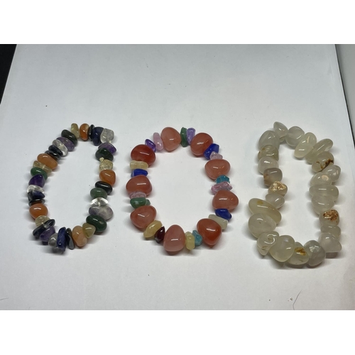 527 - FIVE COLOURED STONE BRACELETS