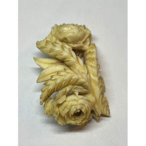 537 - TWO CARVED BONE BROOCHES IN A WHEATSHEAF DESIGN WITH A PRESENTATION BOX