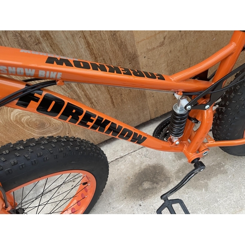 1203 - AN AS NEW FOREKNOW SUPERLITE MOUNTAIN BIKE WITH BREAK DISCS AND 24 SPEED SHIMANO GEAR SYSTEM