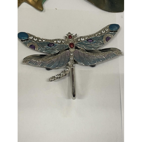 104 - A PORCELAIN BUTTERFLY LADY MASK, LEATHER LADY PLAQUE AND DRAGONFLY HOOK