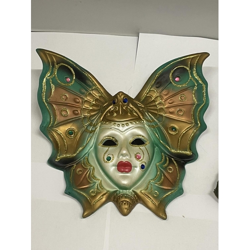 104 - A PORCELAIN BUTTERFLY LADY MASK, LEATHER LADY PLAQUE AND DRAGONFLY HOOK