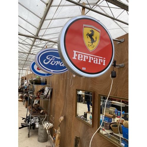 1219 - AN ILLUMINATED CIRCULAR DOUBLE SIDDED FERRARI WALL SIGN