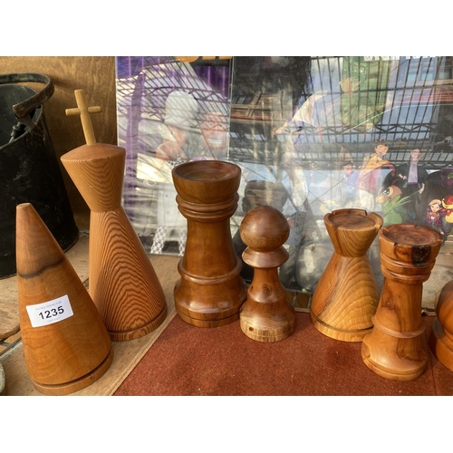 1235 - AN ASSORTMENT OF WOODEN CARVED CHESS PIECES