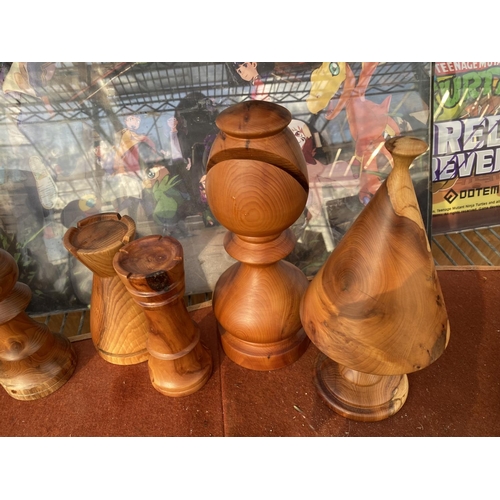 1235 - AN ASSORTMENT OF WOODEN CARVED CHESS PIECES