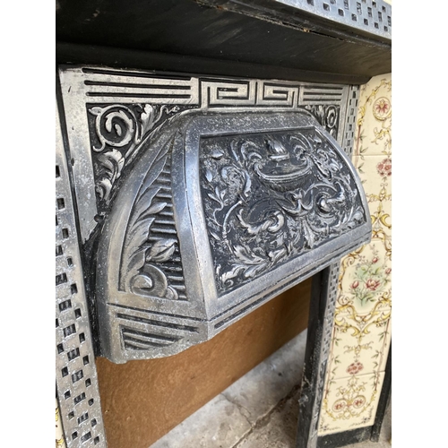 1254 - AN ALUMINIUM AND TILED FIRE SURROUND