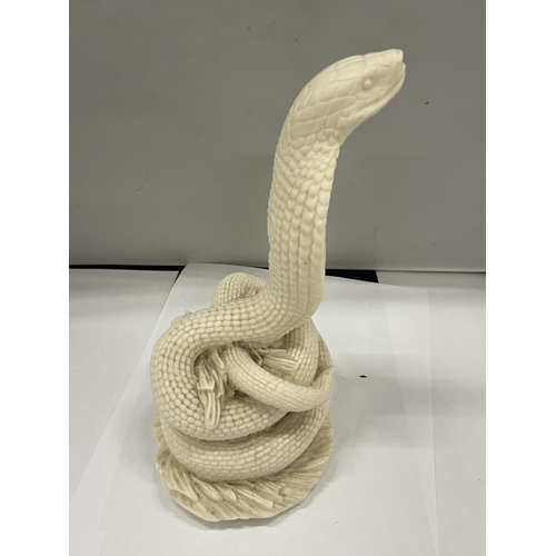 127 - A RESIN MODEL OF A COBRA HEIGHT 24CM