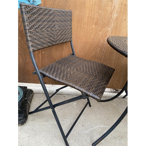 1282 - A RATTAN FIVE PIECE BISTRO SET TO INCLUDE ROUND TABLE AND FOUR CHAIRS