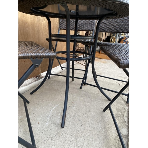 1282 - A RATTAN FIVE PIECE BISTRO SET TO INCLUDE ROUND TABLE AND FOUR CHAIRS