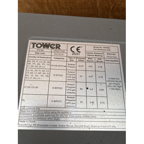 1299 - A TOWER GAS BBQ AND TWO GAS BOTTLES