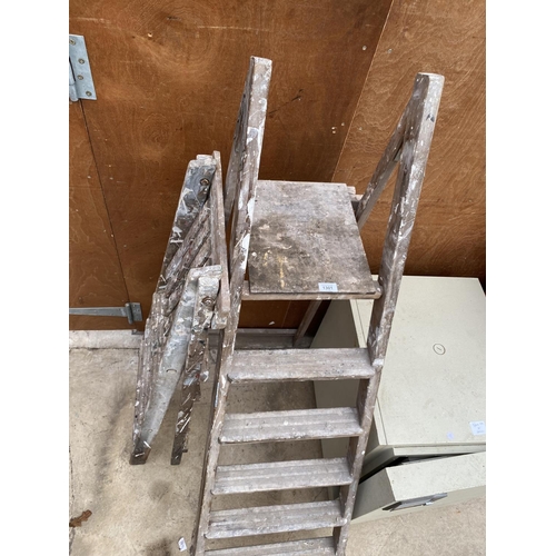 1301 - TWO VINTAGE WOODEN STEP LADDERS TO INCLUDE A FIVE RUNG AND A THREE RUNG