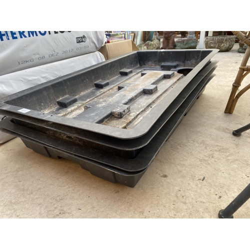 1311 - FOUR HARD PLASTIC POTTING TRAYS