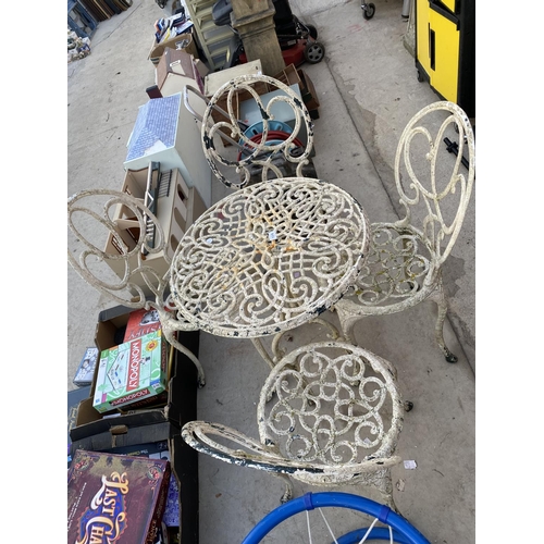 1318 - A CAST ALLOY BISTRO SET COMPRISING OF A ROUND TABLE AND FOUR CHAIRS