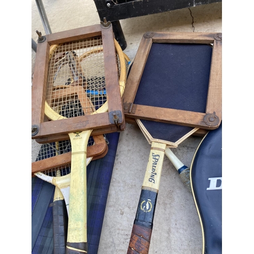 1333 - AN ASSORTMENT OF VINTAGE WOODEN TENNIS AND BADMINTON RACKETS SOME WITH COVERS