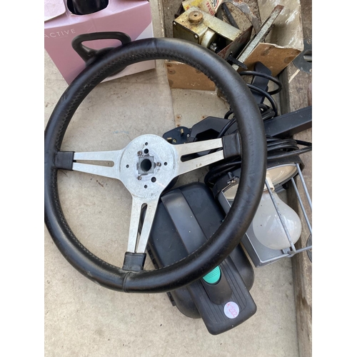 1334 - AN ASSORTMENT OF ITEMS TO INCLUDE SPIRIT LEVELS, LIGHTS AND A STEERING WHEEL