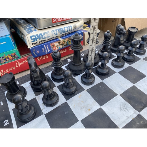 1363 - AN OUTDOOR CHESS SET WITH CHESS BOARD MAT