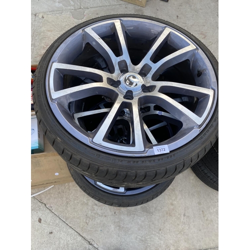 1372 - A SET OF FOUR VAUXHALL ASTRA ALLOY WHEELS WITH 225/35ZR19 LOW PROFILE TYRES