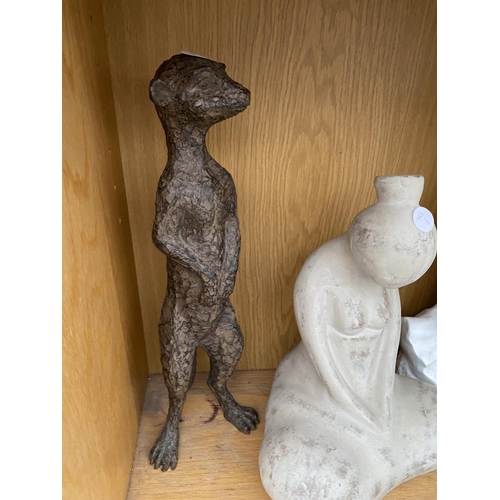 1402 - THREE ORNAMENTS AND A CANDLE HOLDER TO INCLUDE A MEERKAT ETC