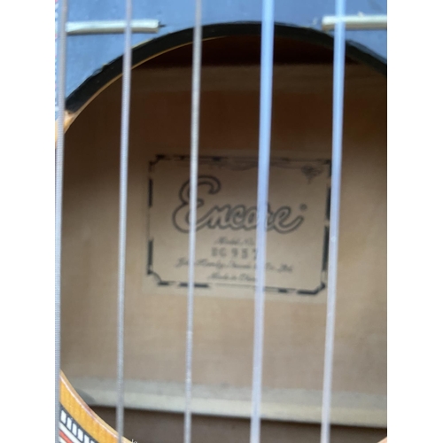 1482 - AN ENCORE MODEL. MG957 ACOUSTIC GUITAR WITH CARRY CASE