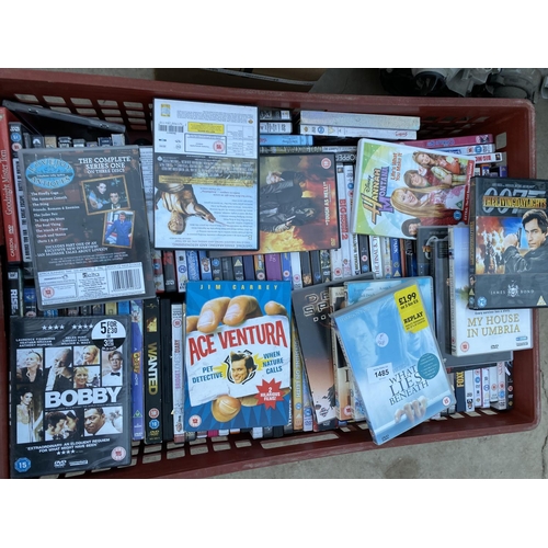 1485 - A LARGE ASSORTMENT OF DVDS, VHS AND CASSETTES ETC