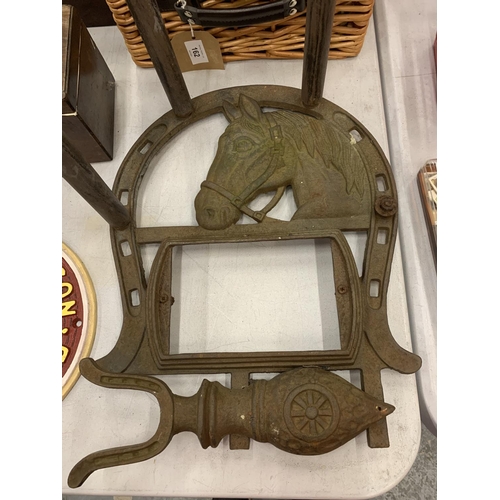 161 - A VINTAGE CAST IRON BOOT SCRAPER AND WELLINGTON HOLDER WITH HORSESHEAD DECORATION