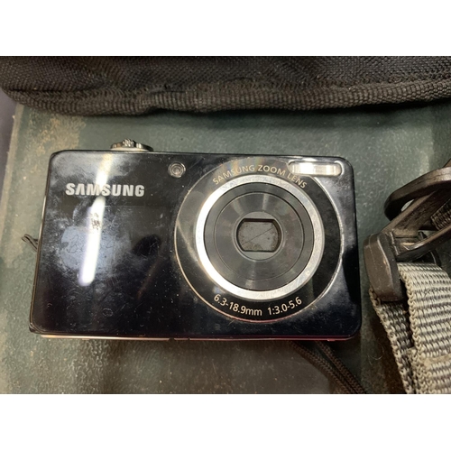 220 - A VINTAGE OLYMPUS ZOOM CAMERA, MAXIM DIGITAL CAMERA, FUJIFILM HS 10 AND A SAMSUNG ZOOM LENS, THREE I... 