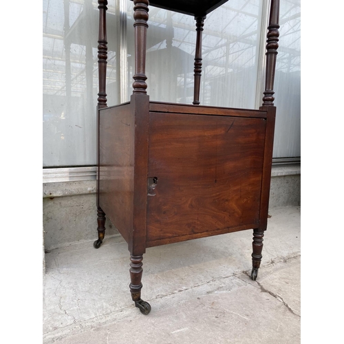 2201 - A 19TH CENTURY MAHOGANY THREE TIER WHATNOT WITH CUPBOARD TO THE BASE, ON TURNED UPRIGHTS, 16.5