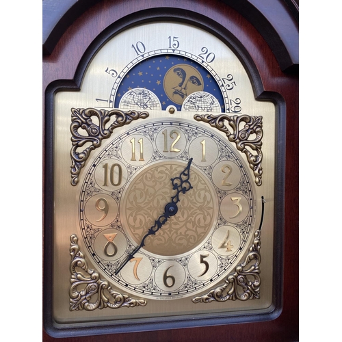 2205 - A MODERN BRASS FACED LONGCASE CLOCK WITH ROLLING MOON, THREE WEIGHTS AND SWAN NECK PEDIMENT