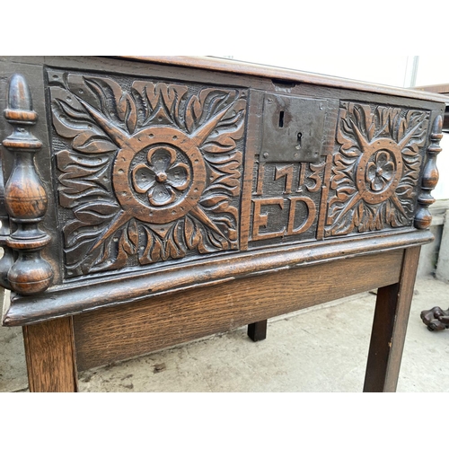 2209 - AN 18TH CENTURY OAK BIBLE BOX ON LATER STAND WITH CARVING AND INSCRIPTION TO THE FRONT PANEL (1715, ... 