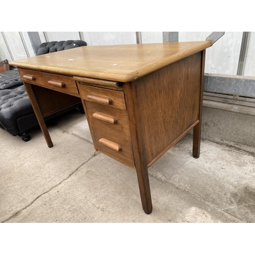 2217 - A MID 20TH CENTURY 'ABBESS' OAK SINGLE PEDESTAL OFFICE DESK, 48X26