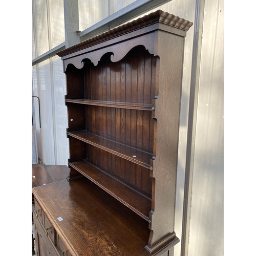 2234 - A MID 20TH CENTURY OAK 'WARING & GILLOW' DRESSER COMPLETE WITH PLATE RACK, 45