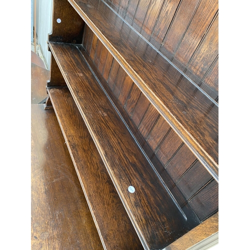 2234 - A MID 20TH CENTURY OAK 'WARING & GILLOW' DRESSER COMPLETE WITH PLATE RACK, 45