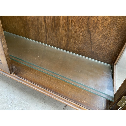 2248 - A MID 20TH CENTURY MAHOGANY TWO DOOR DISPLAY CABINET ON CABRIOLE LEGS, 37