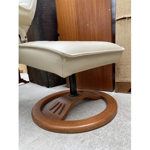 2283 - A CREAM SWIVEL RECLINER AND STOOL