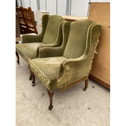 2321 - A PAIR OF EDWARDIAN WING-BACK FIRESIDE CHAIRS, ON FRONT CABRIOLE LEGS