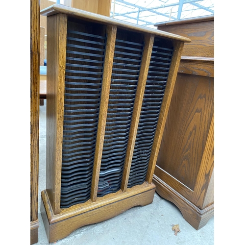 2329 - AN OAK 'JAYCEE' CD RACK, 20