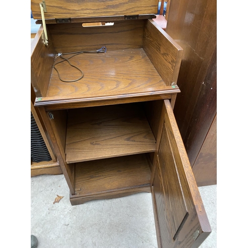 2330 - AN OAK 'JAYCEE' STEREO CABINET, 21