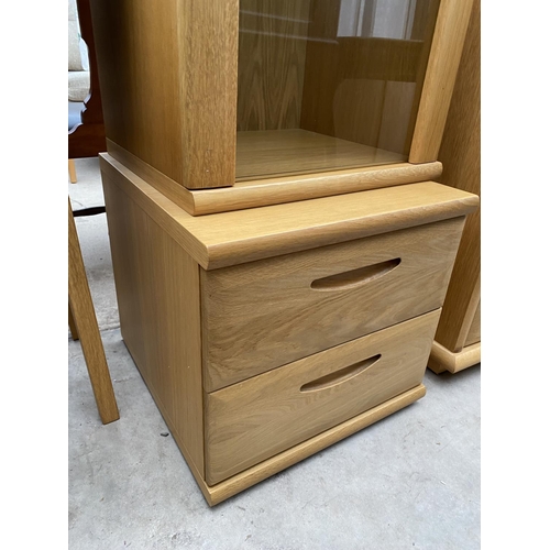 2335 - A MODERN OAK TALL DISPLAY CABINET WITH TWO DRAWERS TO THE BASE, 19