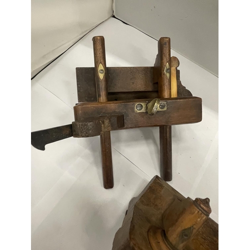 234 - AN ANTIQUE FRUITWOOD PLOUGH PLANE TOGETHER WITH A THUMB SCREW PLOUGH