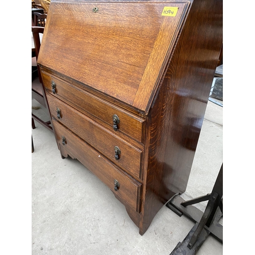 2345 - AN EARLY 20TH CENTURY OAK GLAZED AND LEADED BUREAU BOOKCASE, 32.5