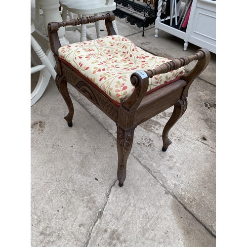 2367 - AN EDWARDIAN PIANO STOOL ON CABRIOLE LEGS