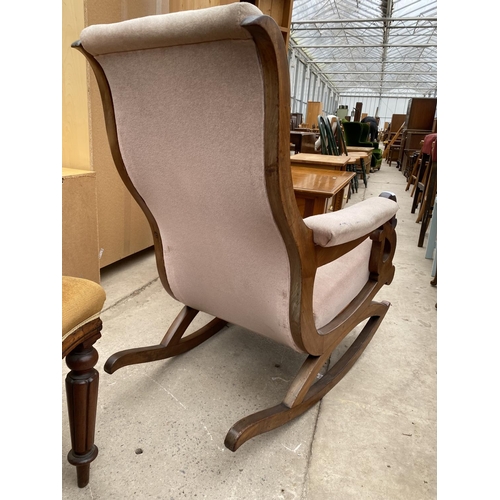 2369 - A VICTORIAN MAHOGANY ROCKING CHAIR