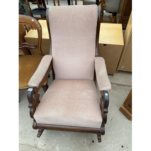 2369 - A VICTORIAN MAHOGANY ROCKING CHAIR