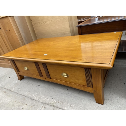 2371 - A 'WINSOR FURNITURE' COFFEE TABLE WITH FOUR DRAWERS, HAVING SCOOP HANDLE, 54X31