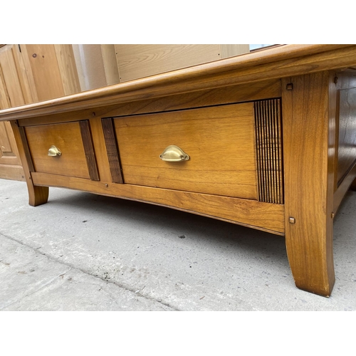 2371 - A 'WINSOR FURNITURE' COFFEE TABLE WITH FOUR DRAWERS, HAVING SCOOP HANDLE, 54X31