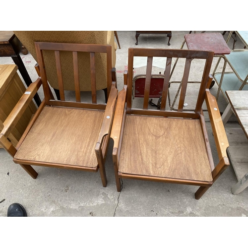 2378 - A PAIR OF RETRO TEAK SCANDINAVIAN FIRESIDE CHAIRS IN THE 'ARNE WAHL IVERSEN' STYLE